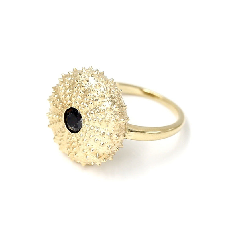 14k gold sea urchin ring with black diamond side view on white background