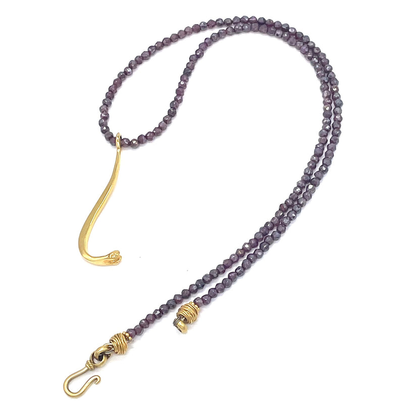 gold vermeil raccoon pecker pendant on purple beads