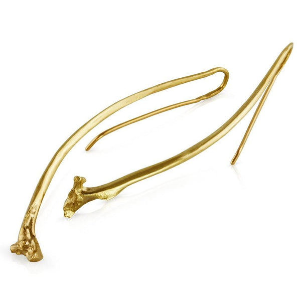 gold vermeil rattlesnake rib earrings on white background