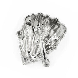 alpaca oyster shell salt and pepper well and spoon on white background