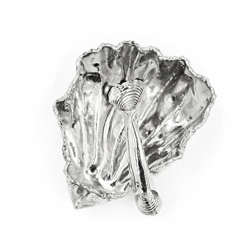 alpaca oyster shell salt and pepper well and spoon on white background