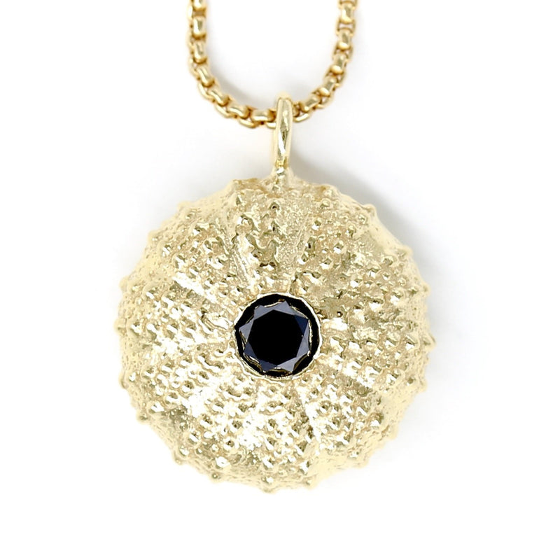 14k gold sea urchin pendant with black diamond on gold chain