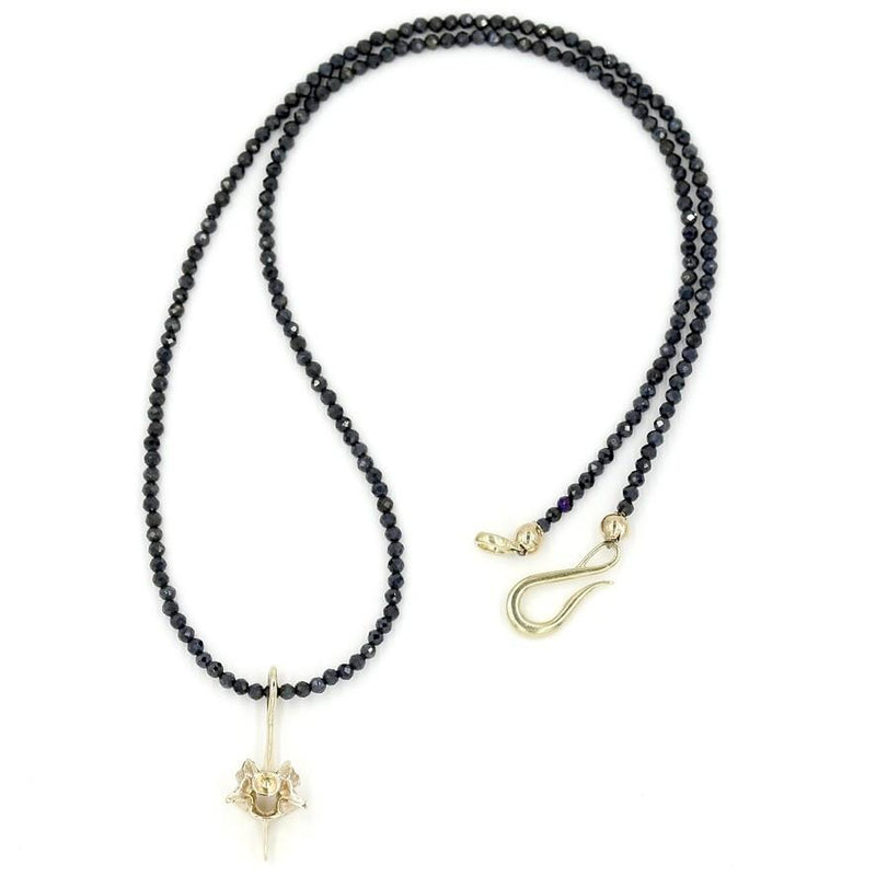 sterling silver rattlesnake vertebrae pendant on black beads