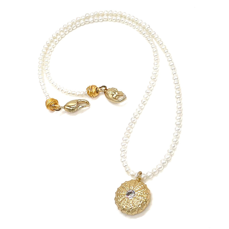 gold vermeil sea urchin pendant with cz on pearl strand