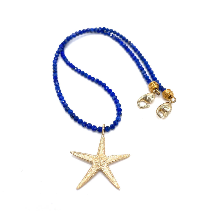 small starfish pendant necklace 14k gold on deep blue beads gogo jewelry