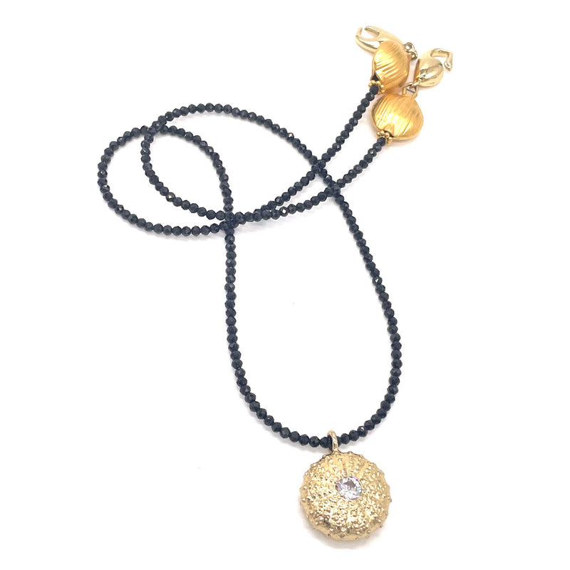gold vermeil sea urchin pendant with cz on black beads
