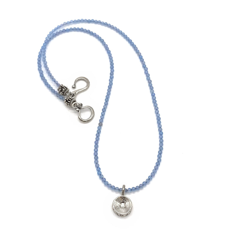 small shark vertebrae pendant necklace sterling silver light blue bead gogo jewelry