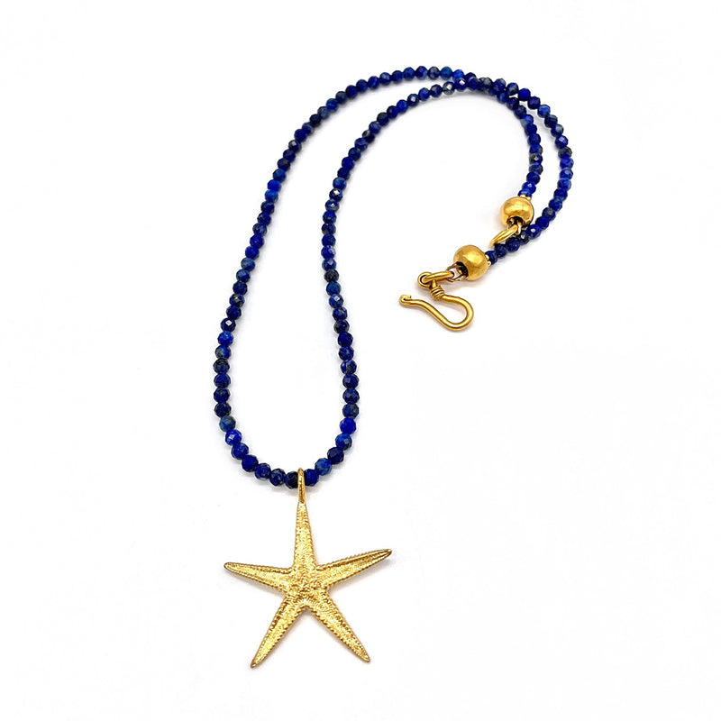 gold vermeil small starfish pendant necklace on blue lapis beads