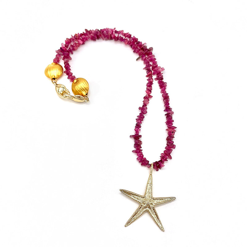 small gold vermeil starfish penant necklace on pink chipped quartz bead