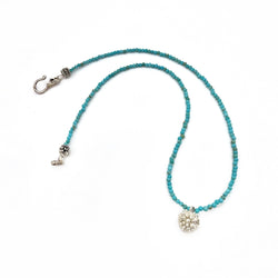 sterling silver kousa dogwood pendant necklace on turquoise beads