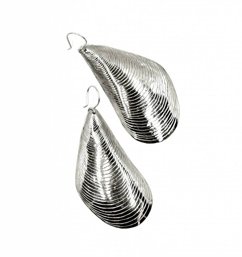 alpaca mussel shell earrings on white background