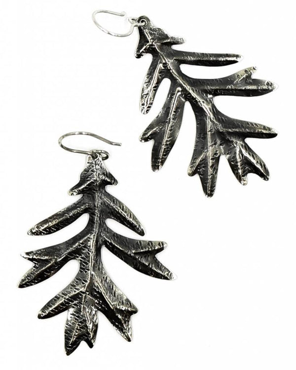 alpaca oxidized oak leaf earrings on white background