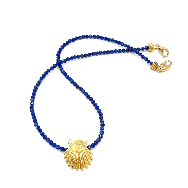 small 14k gold scallop shell pendant on blue lapis bead