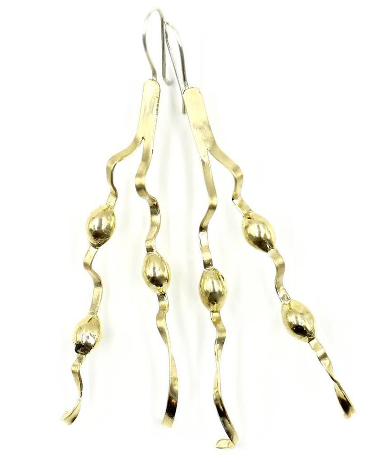 tumbaga new england seaweed wire earrings on white background
