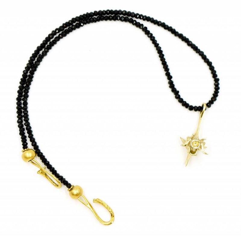 gold vermeil rattlesnake vertebrae large pendant on black beads