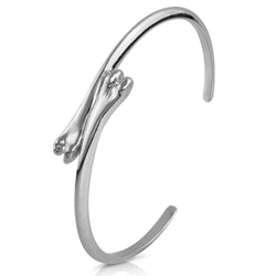 sterling silver raccoon pecker cuff on white background